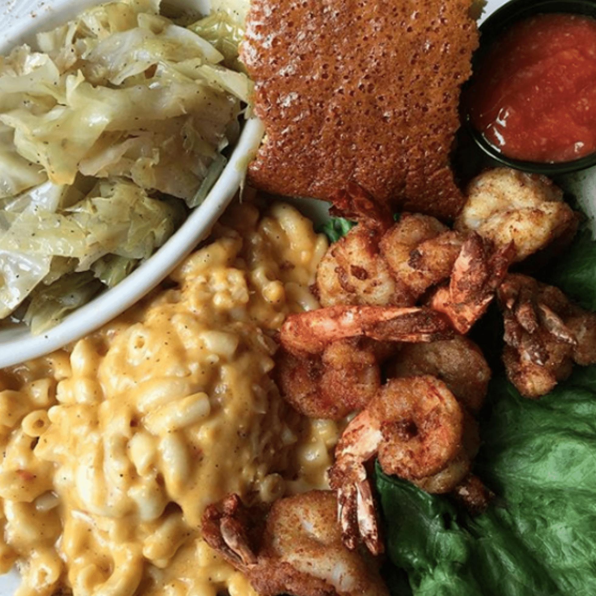 Cabbage, Cornbread, Shrimp, and mac and cheese from Croaker's Spot in Richmond VA